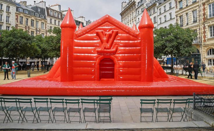 an inflatable building with chairs around it