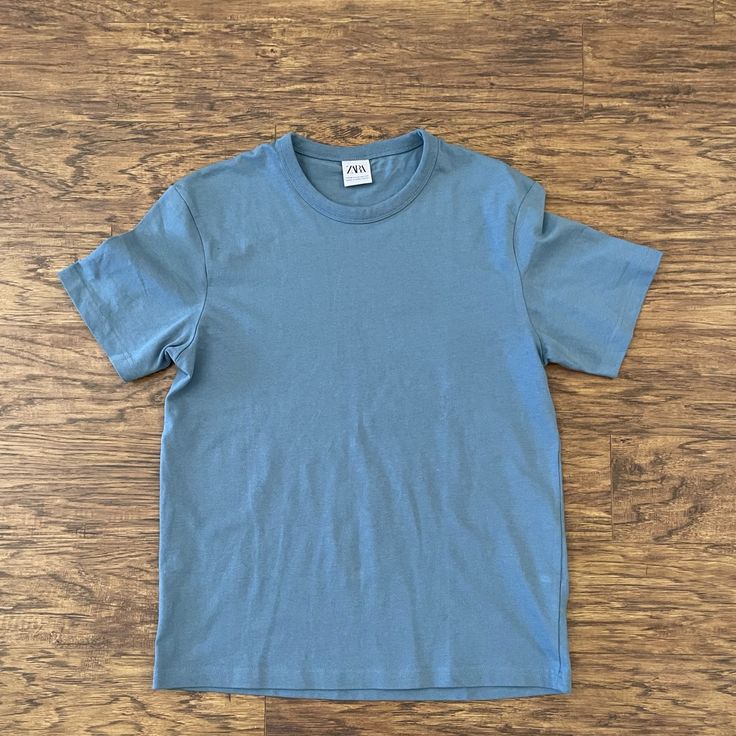 Nwot Zara Heavyweight Basic T Shirt. Model Picture Is To Show The Fit. Color Is A Light Blue Casual Washed Blue T-shirt For Everyday, Washed Blue Relaxed Fit Graphic Tee, Basic Washed Blue Relaxed Fit Tops, Light Blue Pre-shrunk Cotton T-shirt, Washed Blue Cotton Crew Neck T-shirt, Washed Blue Cotton Crew Neck Top, Everyday Washed Blue Cotton Tops, Basic Washed Blue Cotton Tops, Light Blue Short Sleeve Plain Tops