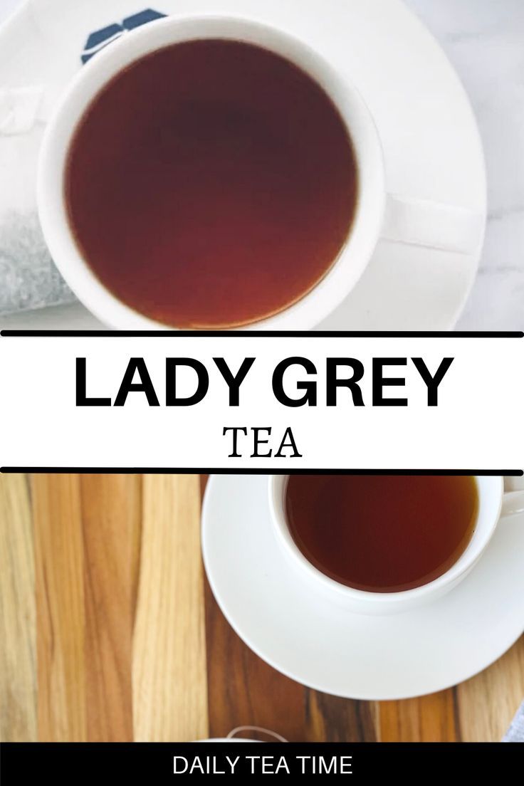 lady grey tea in a white cup and saucer on top of a wooden table