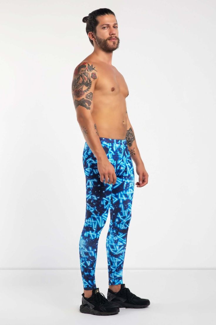 Description: Blue and Black Printed Men's Leggings Breathable & Moisture Wicking 4-Way Stretch Fabric Machine Wash Cold, Quick Drying High Stretch Nylon / Spandex Bolt Logo Patch This design does not have pockets Model is 5’8” (177cm) tall, 32” (82cm) waist and wears size Small. Blue Nylon Leggings For Training, Blue Nylon Sportswear Leggings, Blue Nylon Sportswear Yoga Pants, Blue Nylon Full-length Activewear, Blue Nylon Yoga Pants, Blue Nylon Yoga Pants Sportswear, Blue Moisture-wicking Nylon Leggings, Blue Leggings With Elastic Waistband For Gym, Blue Fitted Nylon Yoga Pants