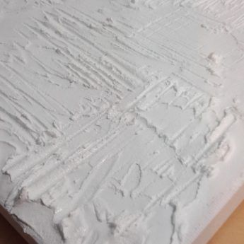 a close up view of the snow on top of a bed sheet that has been made to look like it is falling