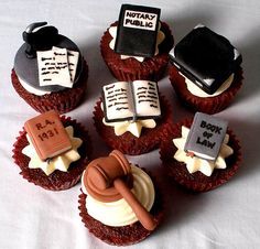 cupcakes decorated with books and law symbols