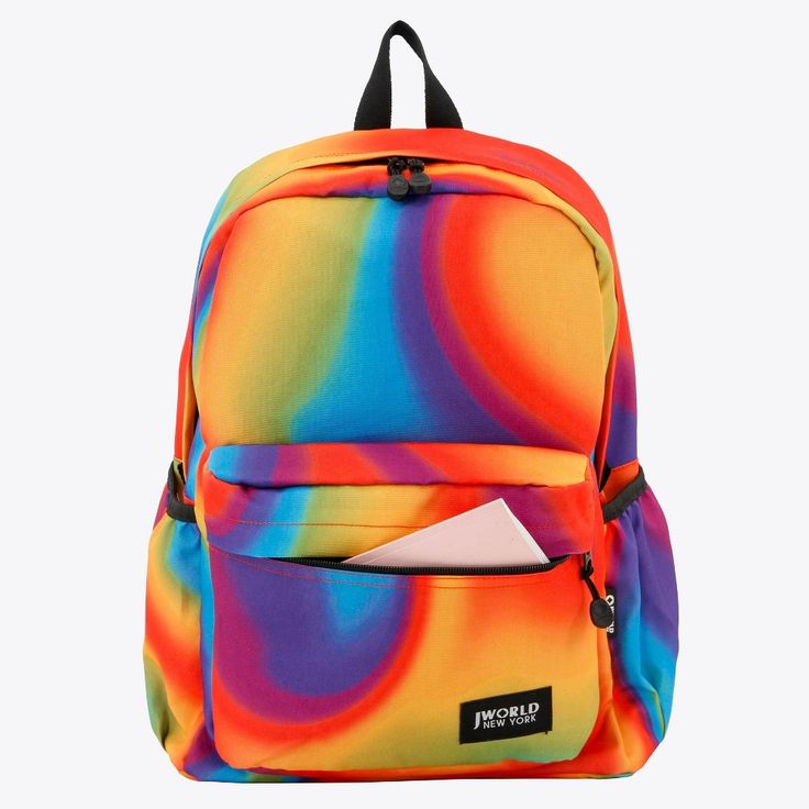 Available in a variety of bold graphic prints, this classic backpack offers style and storage for the daily commute to school or occasional day trips around town. The J World Oz backpack is made from durable HP Duraceltex and polyester fabrics and features a back cushion and ergonomic S-shaped shoulder straps for all day carrying comfort. This backpack has a roomy main compartment to hold books, folders, or extra layers and a front zippered pocket to hold your cell phone, pens, keys, school supp Multicolor Casual Backpack For Study, Casual Multicolor Backpack For Study, Casual Multicolor Study Backpack, Multicolor Standard Backpack For Study, Multicolor Softback Backpack For Students, Daily Backpack, Classic Backpack, Water Resistant Fabric, Laptop Pocket