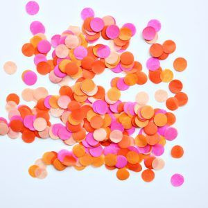 pink and orange confetti on white background