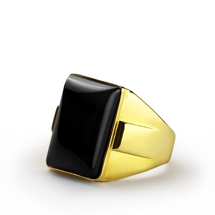 Metal: 14k Yellow Gold Onyx: 1.3cm x 1.8cm (0.5" x 0.7") shape - cabochon setting type - Bezel setting Product weight: 10.0 gr Compelling color and bold design help you make a strong style statement! Power and beauty come to mind in the presence of this stunning 14k gold ring. One large onyx cabochon anchors the piece at the center. The right ring can speak volumes about your personal taste and aesthetic. ----------------------------------------------------------------------Onyx The myth of the Classic Black Signet Ring With Polished Edges, Modern Onyx Signet Ring For Anniversary, Classic Black Signet Ring For Formal Occasions, Modern Black Formal Jewelry, Modern Black Signet Ring With Polished Edges, Classic Onyx Rectangular Signet Ring, Black Rectangular Signet Ring For Anniversary, Classic Black Rings With Polished Edges, Modern Onyx Rings For Formal Occasions