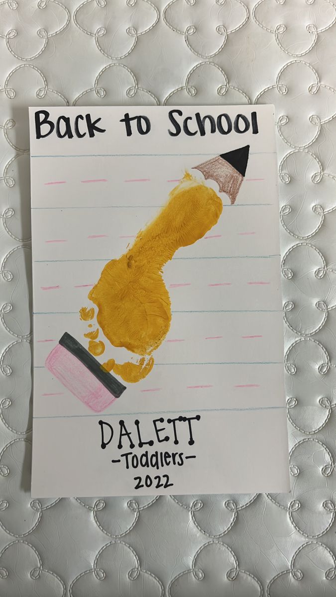 a back to school poster with a pencil and handprinted image of a child's drawing