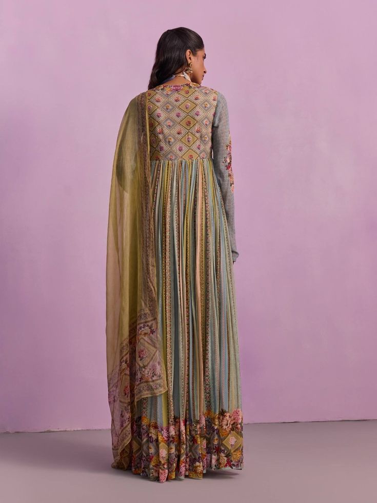 Radiate elegance in our captivating Riah anarkali set, featuring classic beads and sequins on the yoke and sleeves, expertly accomplished through hand stitching. Designed with a flattering V-curve neckline and paired with a complementing color dupatta, this outfit is perfect for elevating your party look, ensuring you make a stunning impression at any event. Transitional Anarkali Style Floor-length Palazzo Set, Unstitched Pista Green Anarkali Set, Anarkali Palazzo Set With Resham Embroidery, Transitional Anarkali Set With Dupatta In Georgette, Transitional Georgette Anarkali Set With Dupatta, Anarkali Style Multicolor Kurta With Cutdana, Traditional Anarkali Set With Mirror Work And Long Sleeves, Anarkali Salwar Kameez With Dupatta And Long Sleeves, Transitional Maxi-length Anarkali Set With Dabka Work