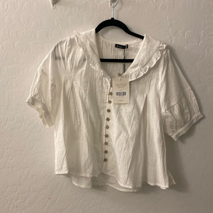 Nwt Bohme White Cotton Blouse. Peter Pan Like Collar. One Of Straps From Button Pulled Out. (Details In Picture) Shirt Fits Loosely. Smoke Free Home Casual Blouse With Peter Pan Collar And Button Closure, Casual Tops With Peter Pan Collar And Button Closure, Chic Top With Peter Pan Collar And Buttons, Chic Tops With Peter Pan Collar And Buttons, Casual Top With Ruffled Collar And Button Closure, Casual Tops With Button Closure And Ruffled Collar, Chic Button-up Daytime Blouse, Chic Button-up Blouse For Daytime, Chic Daytime Button-up Blouse