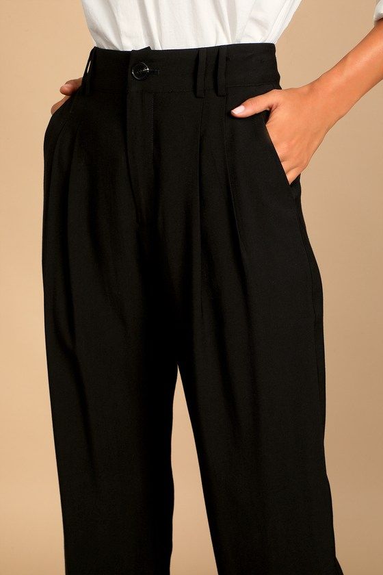 Lulus Exclusive! Per our last email, the Lulus Strictly Business Black High Waisted Trouser Pants are highly recommended for all boss babes! Lightweight woven fabric creates a high waist (with a bit of elastic at the back), belt loops, and a brown marbled top button with a hidden zip fly. Pleated accents detail relaxed pant legs, with two diagonal pockets, that taper to ankle-length hems. Twin patch pockets at back. Pair with the matching blazer for a complete look! Fit: This garment fits true t Chic Solid Color Workwear Bottoms, Trendy High Waist Wide Leg Pants For Date Night, High Waist Wide Leg Pants For Business Casual, Chic Tapered Leg Pants For Date Night, Casual High-waisted Wide Leg Pants For Date Night, Chic Bottoms With Elastic Waistband For Date Night, Trendy High-waisted Workwear Pants, Trendy High-waist Wide Leg Pants For Business Casual, Solid High Waist Wide Leg Pants For Date Night