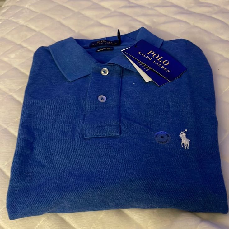 New Rl Polo Shirt. Size Medium, Blue, Classic Fit. Ralph Lauren Blue Polo Collar Shirt, Blue Cotton Ralph Lauren Polo Shirt, Blue Ralph Lauren Polo Shirt, Ralph Lauren Blue Collared Shirt, Blue Collared Ralph Lauren Shirt, Casual Blue Ralph Lauren Shirt, Ralph Lauren Blue Polo Shirt, Blue Ralph Lauren Cotton Tops, Classic Blue Ralph Lauren Tops