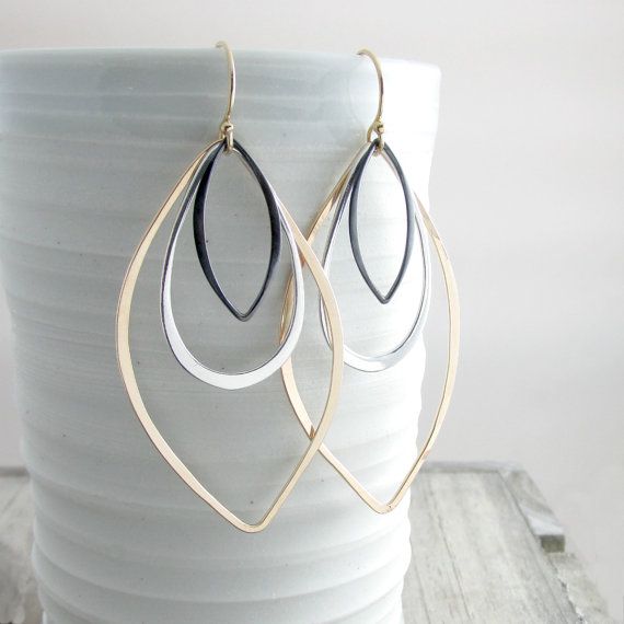 Long Dangle Earrings Geometric Jewelry Gold and Silver Earrings Modern Earrings Bohemian Chic Earrings Gold Earrings Gift For Her Make a statement with these bohemian chic long dangle silver and gold earrings. Gorgeous geometric gold filled and sterling silver hoop earrings to compliment every outfit you have in your closet! Handcrafted large gold filled hoops are paired with oxidized black silver and shiny sterling silver for the perfect earrings to wear anytime. If you love earrings and w... Modern Silver Earrings, Silver Statement Earrings, Mixed Metal Earrings, Mixed Metal Jewelry, Gold Jewelry Earrings, Chic Earrings, Long Dangle Earrings, Geometric Jewelry, Sterling Silver Hoop Earrings