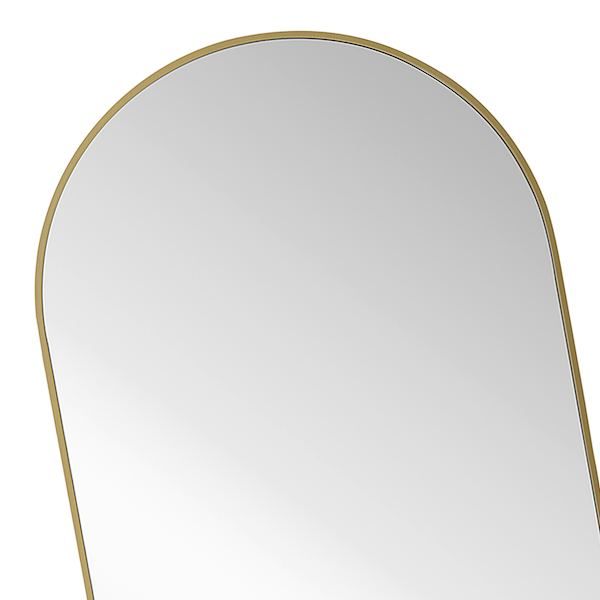 an oval mirror with gold trim around the edges and a curved edge, on a white background