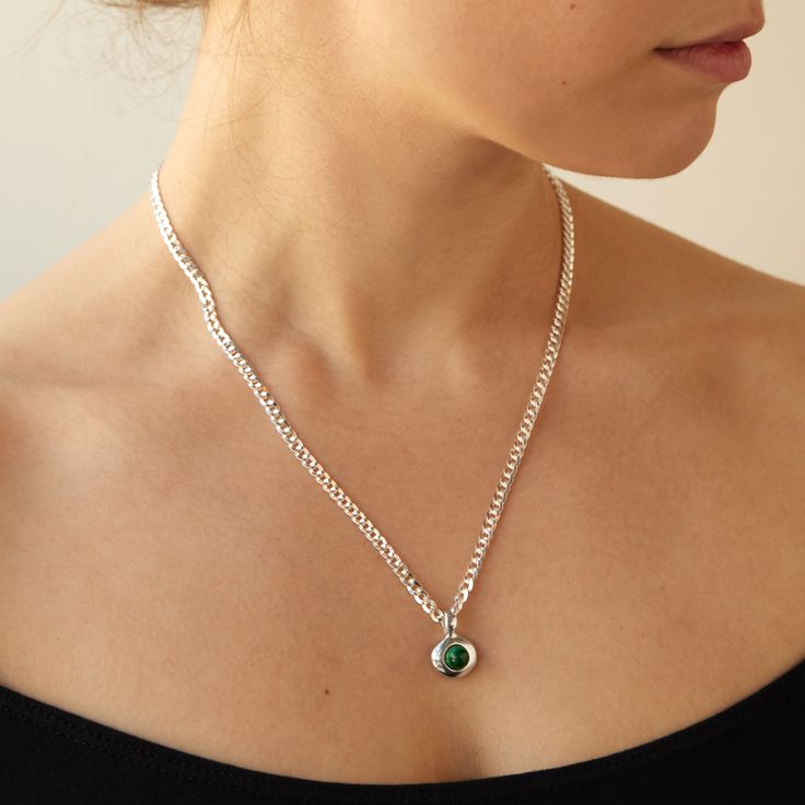 A necklace which expresses the serene feeling of being next to a small pond. Malachite in a pool of silver makes for a striking little sculpture to wear! Liquidy, gorgeous, super super super special silver by new designer Aeri Go.