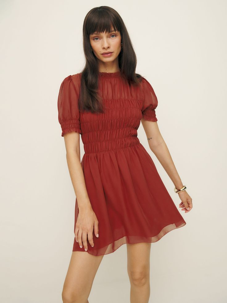 Short and sweet. Shop the Mimsy Dress from Reformation,  a mini dress with a high neckline, short puffed sleeves, and shirring throughout. Extra Dresses, Red Short Sleeve Dress, Scottish Dress, Green Cotton Dress, Elle Dress, Shirred Dress, Sweet Shop, Linen Mini Dress, Short And Sweet