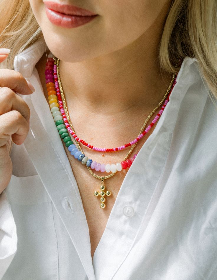 Limited Edition Necklace Petite, but playful. This necklace is a perfect sprinkle of pink and red! Co-designed with influencer and Living Fully founder, Mallory Ervin, this piece instantly elevates a look. Be sure to follow Mallory, @malloryervin! 4mm red and pink seed bead water resistant and sweat proof Trendy Red Necklace With Colorful Beads, Trendy Red Necklaces With Colorful Beads, Trendy Red Necklaces With Round Beads, Trendy Red Round Bead Necklaces, Trendy Red Round Beads Necklace, Trendy Red Necklace With Tiny Beads, Trendy Red Beaded Necklace For Party, Trendy Pink Necklace With Tiny Beads, Trendy Red Beaded Necklace