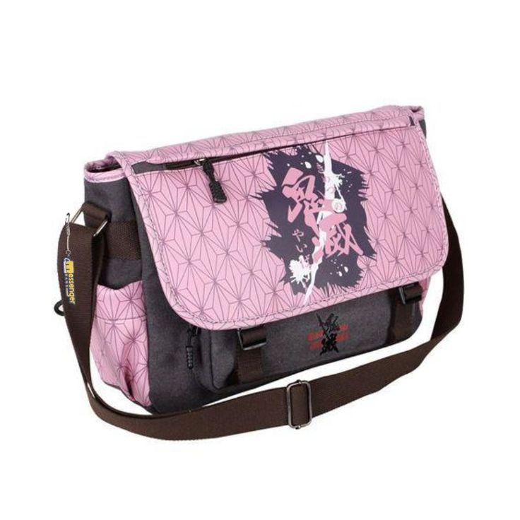 You will love this pink and black Messenger Bag featuring Nazuko Kamado, the central character of the popular Japanese anime "Demon Slayer" (Kametsu no Yaiba in Japanese). This trendy and very girly look makes it the ideal school bag to go to school with style and elegance. The Nezuko Messenger Bag: an ideal bag to carry your favorite things If you like the Japanese anime franchise Demon Slayer, you will love our Nezuko Messenger Bag. The anime made by the animation studio Ufotable has quickly g Slayer Nezuko, Anime Demon Slayer, Small Laptop, Nezuko Kamado, Oxford Fabric, School Backpacks, Tokyo Ghoul, Pink Bag, Anime Demon