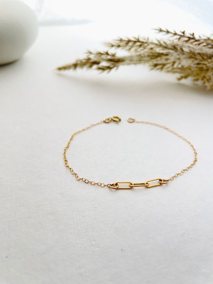 This Two or Three Link Eternity Bracelet is the perfect gift for a best friend, mom, sister, or anniversary. Crafted with two or three links for an elegant double-linking design, it symbolizes the bond of an infinite love. Wrap them in a timeless bracelet that they can treasure forever. The 2 or 3 links represent boundless love, elegantly symbolized Lightweight, contemporary, and effortlessly chic NOTE: Each listing is for ONE friendship bracelet. Select the desired quantity from the drop-down m Simple Gold Bracelets For Friendship, Classic Oval Link Bracelets As Gift, Classic Oval Link Charm Bracelet Gift, Classic Oval Link Charm Bracelet For Gift, Adjustable Chain Link Bracelets As Gifts, Elegant Paperclip Bracelet With Delicate Chain As Gift, Adjustable Chain Link Bracelets For Gifts, Elegant Paperclip Bracelet With Delicate Chain For Gift, Adjustable Chain Link Bracelet Gift