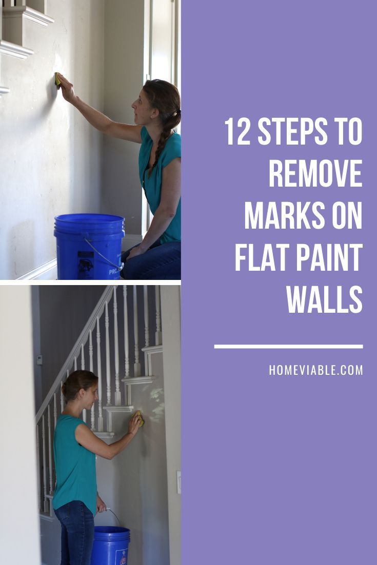 a woman is painting the walls in her house with blue buckets and white paint