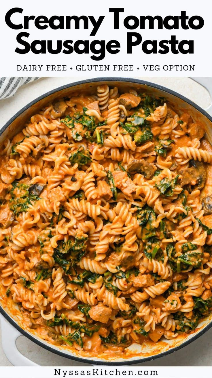 creamy tomato sausage pasta in a skillet with text overlay