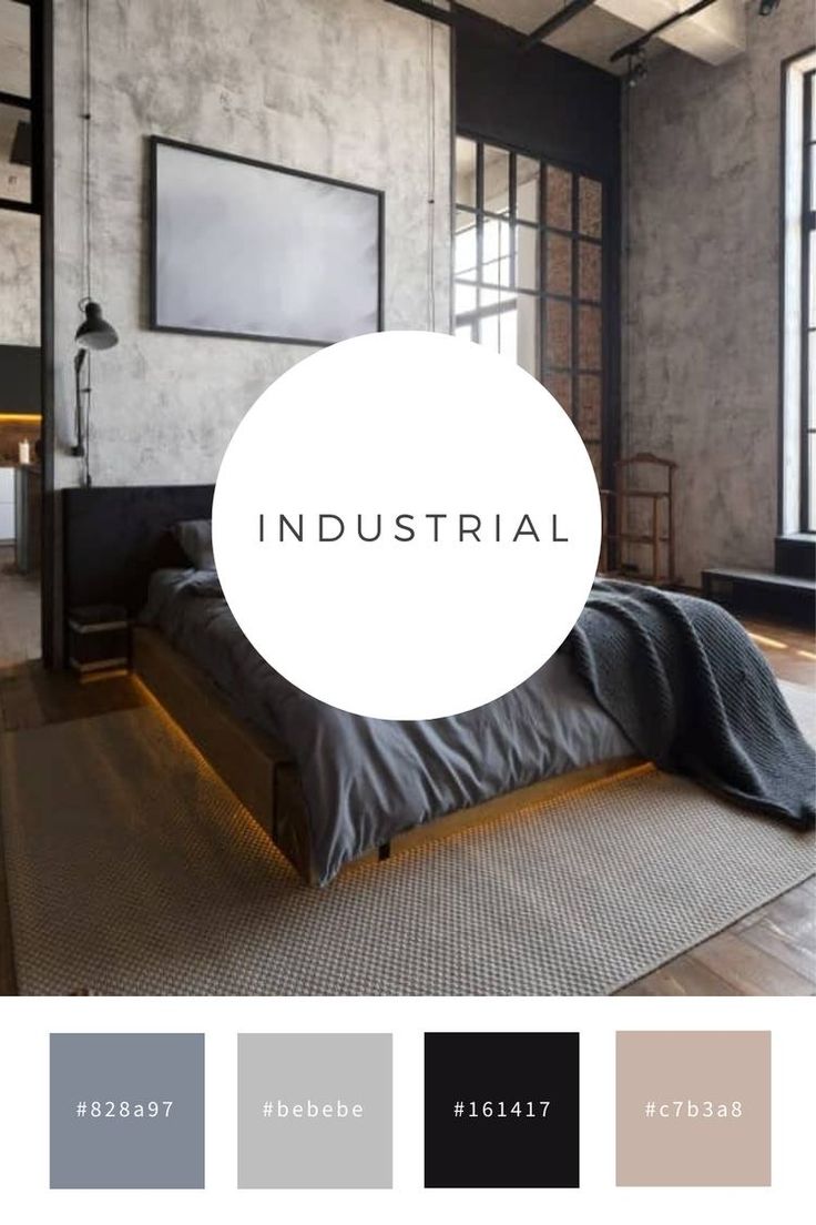 an industrial bedroom with gray walls and wood floors