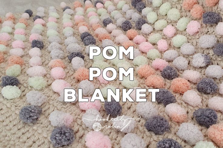 a crocheted blanket with pom - pom blankets on it and the words pom - pom blanket written in white