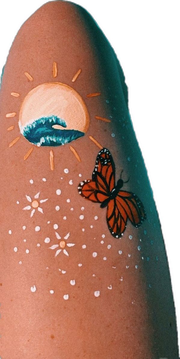 a woman's shoe with butterflies painted on it and the sun above her head