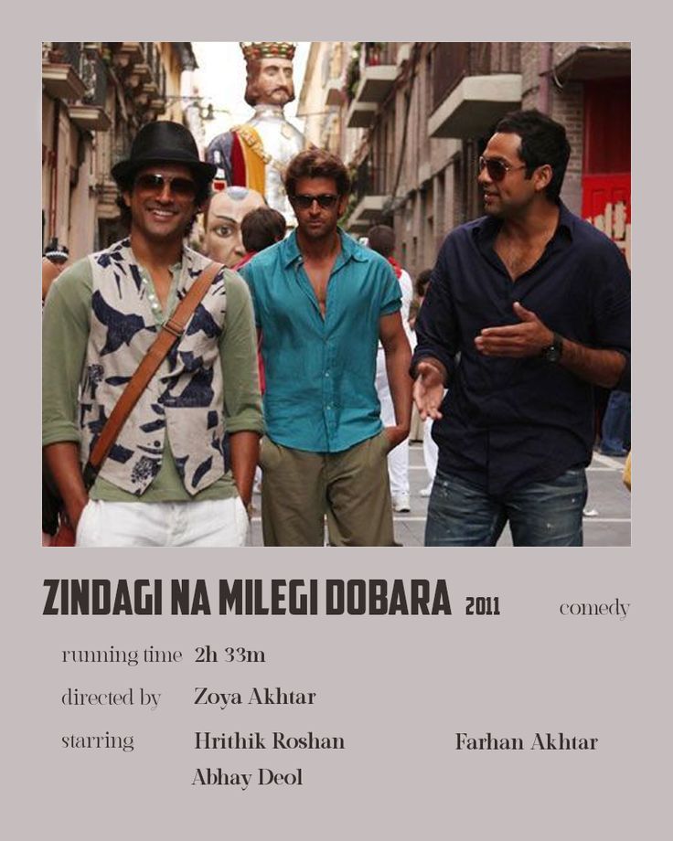 two men standing next to each other in front of a poster for the movie zindagi na melegi dobaa 2011