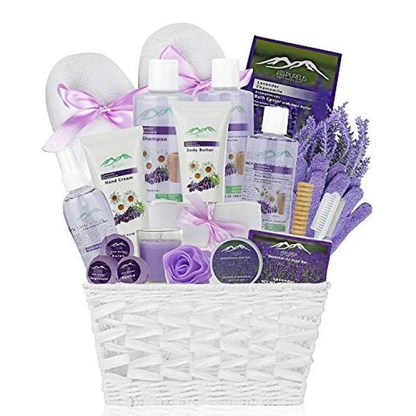 a white basket filled with lavenders and personal care items