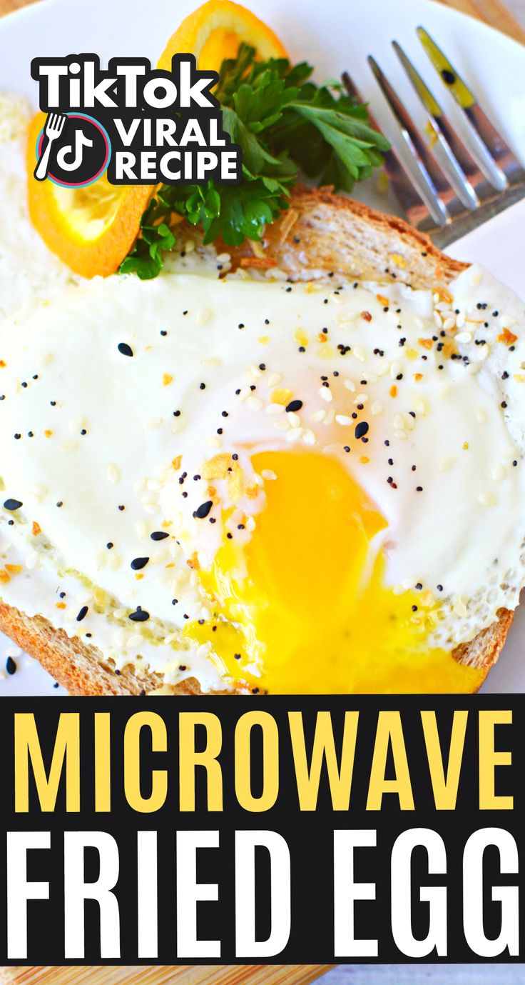 a close up of a plate of food with an egg on it and the words microwave fried eggs