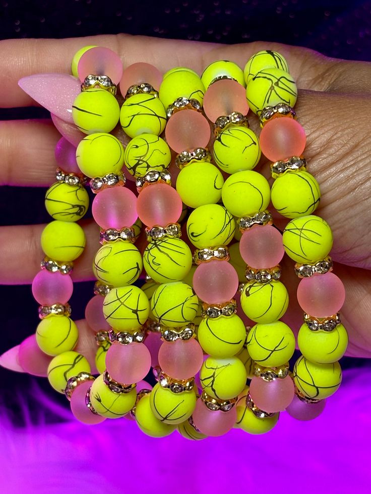 Royal Arm Candy Individual Bracelets feature 8mm or 10mm beads, making it the ideal accessory to adorn your arm and amplify its allure. What do you get: 1 bracelet Fits a 7" wrist but can stretch bigger 10mm beads Yellow Stretch Bracelet With 8mm Beads, Trendy Yellow Bracelets With Round Beads, Trendy Yellow Round Beads Bracelet, Party Stretch Bracelet With 8mm Beads, Party Stretch Bracelet With 8mm Round Beads, Adjustable Yellow Stretch Bracelet With Round Beads, Trendy Yellow Stretch Bracelet With Round Beads, Lemonade Mimosa, Beads Making