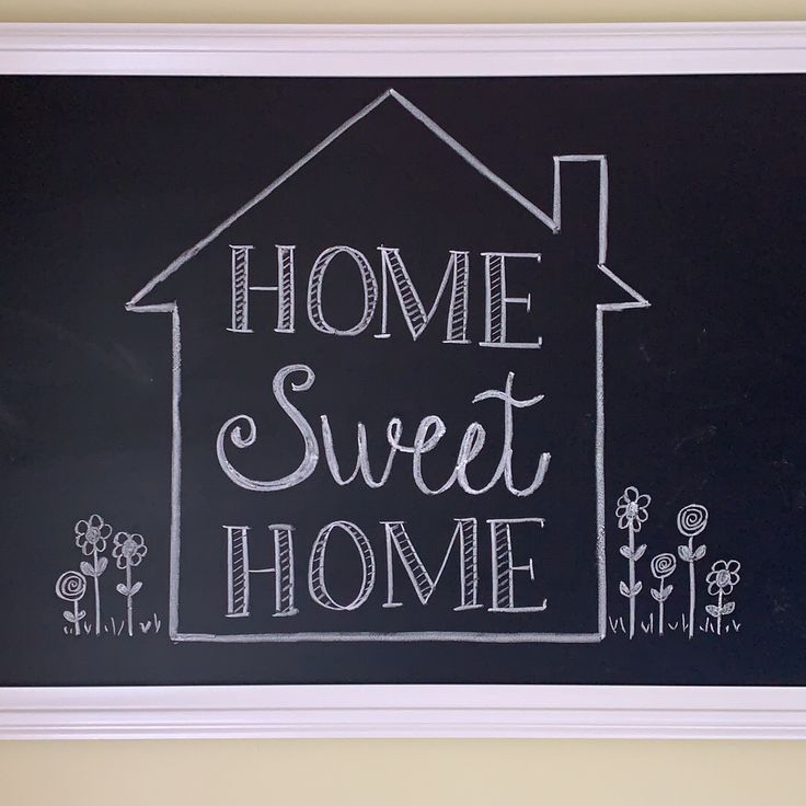 a chalkboard with the words home sweet home written on it