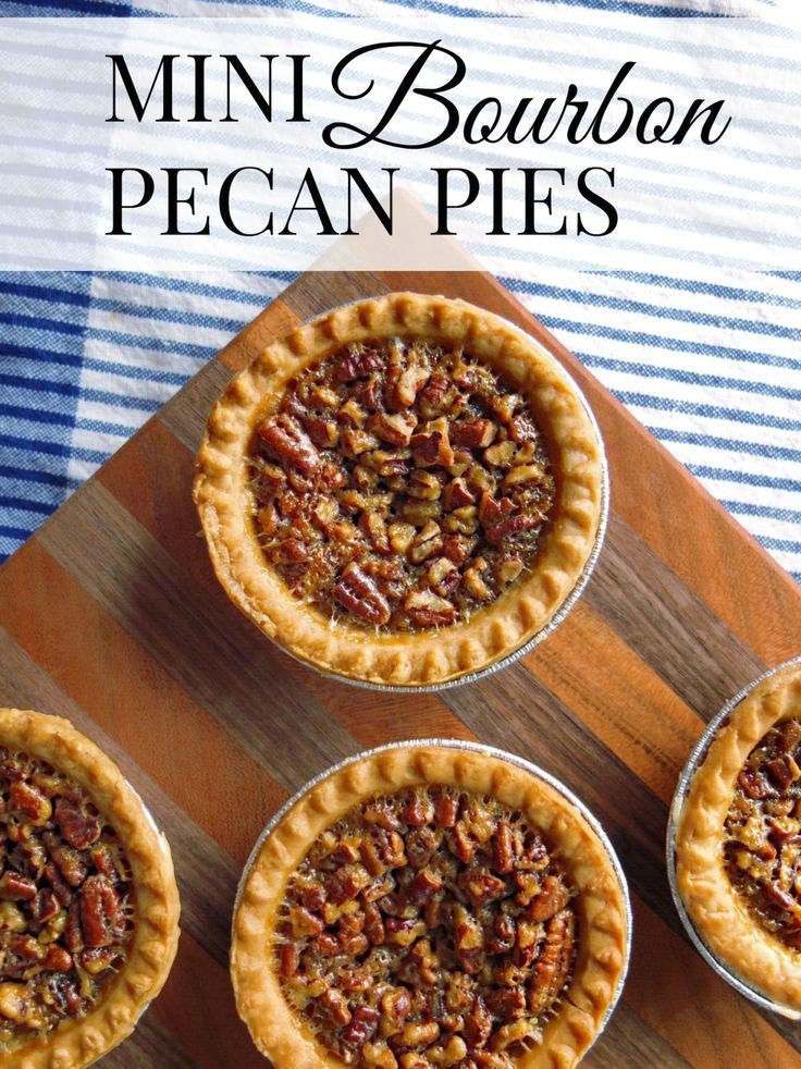 mini bourbon pecan pies on a cutting board with text overlay that reads mini bourbon pecan pies