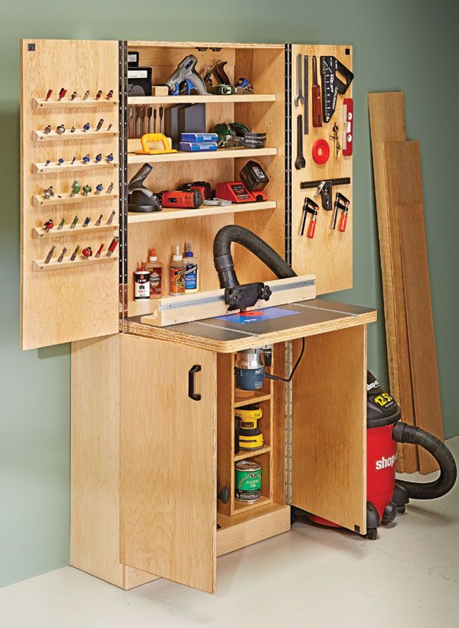 a workbench with tools in it is open to show the contents and equipment inside