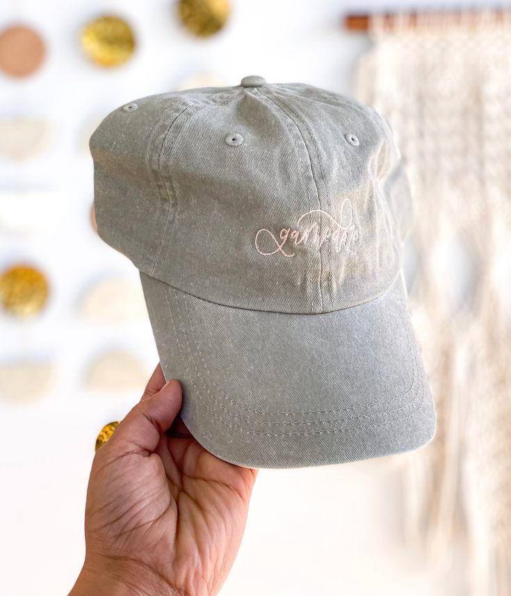 There's something special about gathering together around the tv with burgers and hot dogs, and cheering on your favorite team! This neutral, hand lettered hat is the perfect accessory to your game day apparel, no matter what team you're rooting for! Treat yourself, or gift to a friend who's crazy for football season! 100% cotton dyed twill. Casual Dad Hat For Baseball Season Game Day, Casual Snapback Hat For Game Day, Casual Dad Hat For Baseball Game Day, Casual Game Day Cap, Game Day Cotton Hat With Curved Bill, Adjustable Curved Brim Baseball Cap For Game Day, Casual Snapback Hat With Letter Print For Game Day, Casual Dad Hat Baseball Cap For Game Day, Casual Game Day Baseball Hat