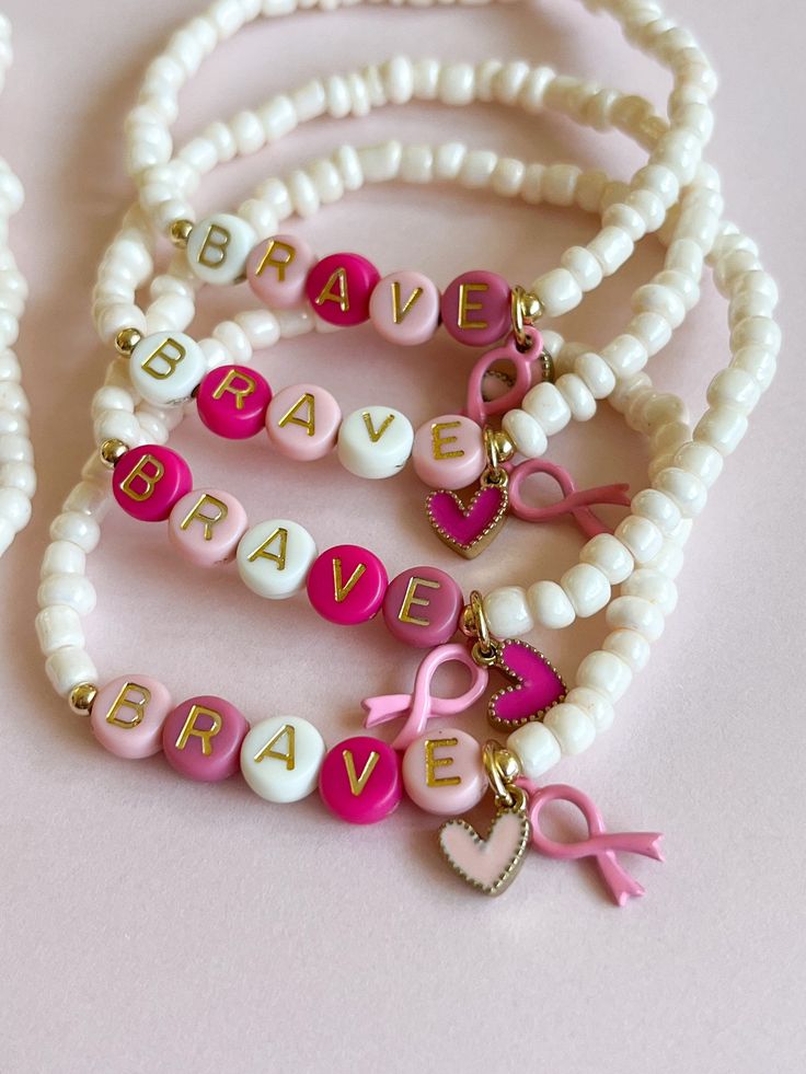 Bracelets For Charity, Diy Mama Bracelet, Clay Bracelet Ideas Pink, Personalized Pink Beaded Bracelet With Meaningful Style, Personalized Pink Beaded Bracelets, Personalized Meaningful Pink Bracelet, Everyday Inspirational Pink Bracelets, Meaningful Pink Jewelry For Friendship, Meaningful White Friendship Bracelets As Gift