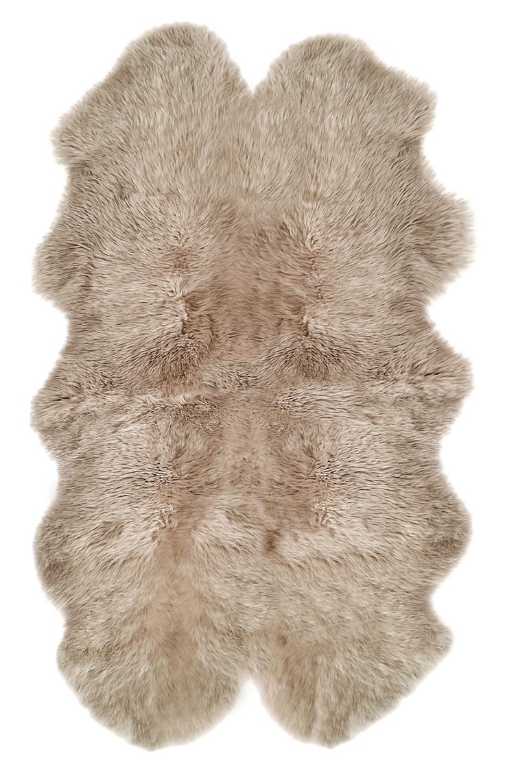 an animal skin rug is shown on a white background