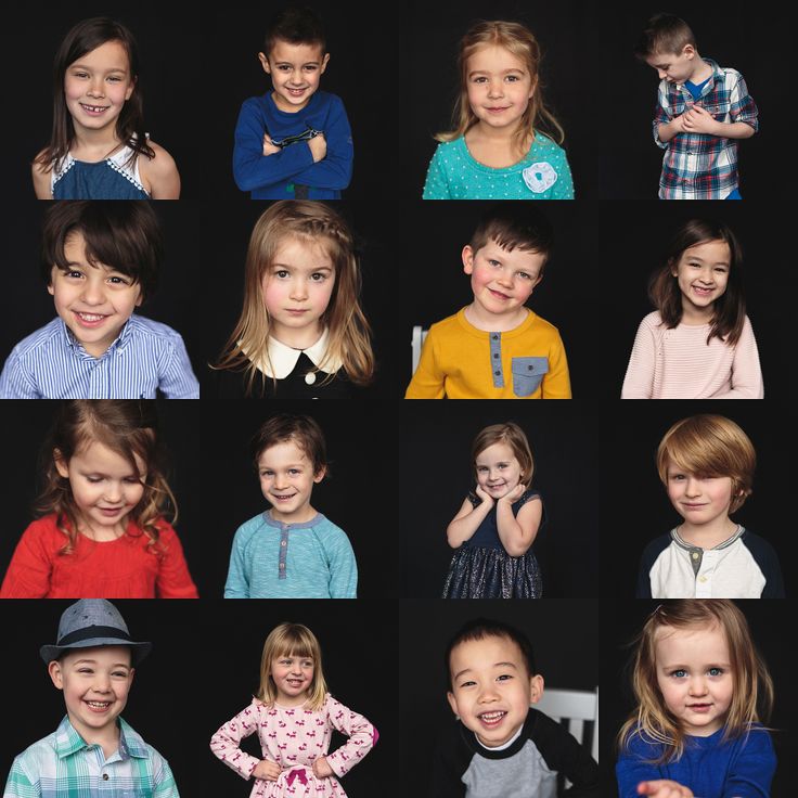 a group of children standing next to each other with their hands on their chests and smiling