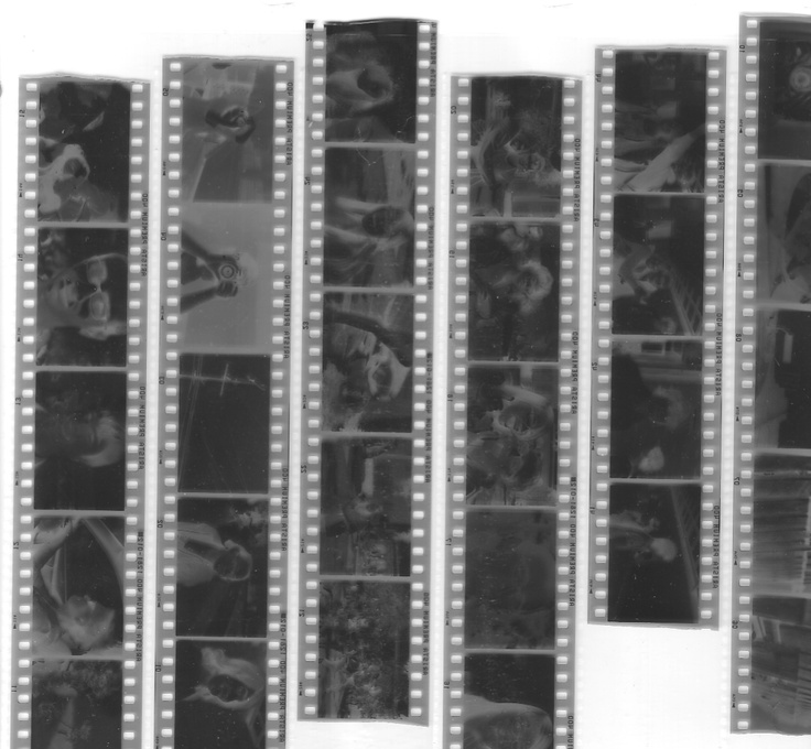 black and white photograph of film strips with people on them