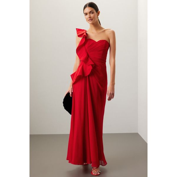 Red chiffon (100% Polyester). Ruffle gown. One shoulder. Sleeveless. 55.5" shoulder to hemline. Side zip closure. Imported. Pre-draped Sleeveless Evening Dress With Ruffles, Sleeveless Ruffled Pre-draped Evening Dress, Sleeveless Pre-draped Evening Dress With Ruffles, Red Chiffon Gala Dress, Pre-draped Ruffle Prom Dress, Red Sleeveless Evening Dress With Ruffles, Formal Sleeveless Evening Dress With Ruffles, Chiffon Sleeveless Evening Dress For Gala, Evening Chiffon Maxi Dress With Ruffled Straps