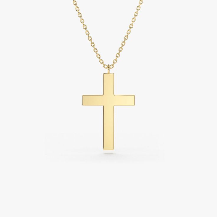 Gold KT: 14K Custom Gold Color: Rose Gold, Yellow Gold, White Gold Cross: 18 x 11 MM This 14k plain gold dangling cross necklace is a simple yet stunning accessory that will add a touch of sophistication to any outfit. The delicate gold chain holds a beautifully crafted cross charm that dances elegantly with every movement. Measuring approximately 18mm in size, this necklace is the perfect size for everyday wear, and the 14k gold construction ensures that it will last for years to come. Cross Charm Necklace, Gold Letter Necklace, Christmas Necklace, Gold Letter, Cross Jewelry, Gold Letters, Gold Cross, Cross Charms, Recycled Gold