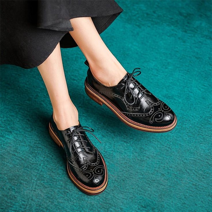 Introducing our Autumn Chic Leather Brogue Lace-up Flats, crafted with the finest quality GENUINE LEATHER for an elegant and sophisticated look. Made from Cow Leather, these flats offer durability and a luxurious feel, while the round toe shape adds a touch of femininity. With a rubber outsole for excellent traction and a Full Grain Leather insole for all-day comfort, these flats are perfect for any occasion. Elevate your style and make a statement with these timeless and versatile flats. Patent Leather Lace-up Shoes With Round Toe For Work, Elegant Leather Lace-up Shoes For Spring, Spring Office Lace-up Shoes With Brogue Detailing, Elegant Flats With Flat Heel For Fall, Elegant Formal Flats For Fall, Elegant Fall Formal Flats, Elegant Formal Fall Flats, Leather Flat Lace-up Shoes With Brogue Detailing, Patent Leather Brogue Lace-up Shoes