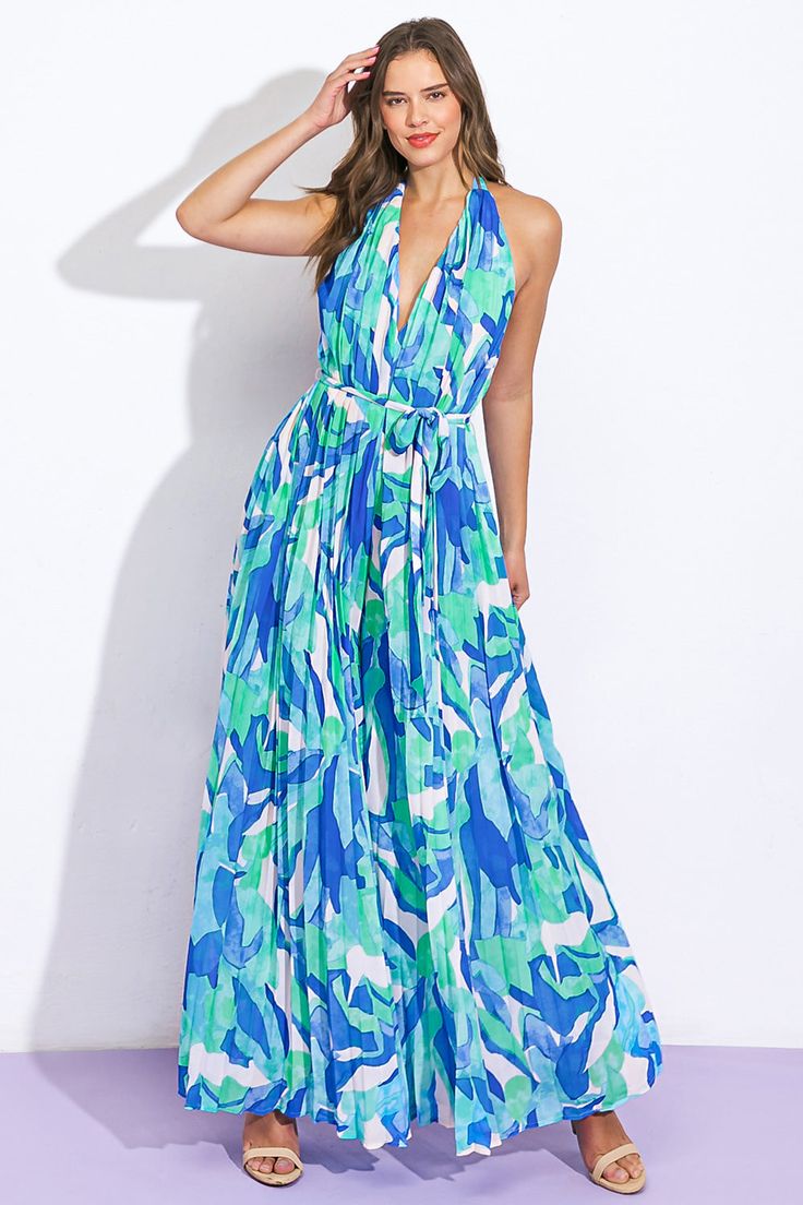 A printed woven jumpsuit featuring plunging V halter neckline, sleeveless, wide leg, self sash tie and bare backDetails:Self : 100% PolyesterLining : 100% PolyesterSize & Fit- Model is 5`8" And Wearing Size Small- Measurements Taken From Size Small- Approx. Length: 58" Blue Sleeveless Tie Back Jumpsuit, Blue Halter Neck Jumpsuits And Rompers For The Beach, Blue Halter Neck Jumpsuit For Beach, Summer Halter Neck Jumpsuit With Tie Back, Blue Summer Halter Neck Jumpsuits And Rompers, Summer Maxi Jumpsuits And Rompers With Tie Waist, Printed Halter Neck Jumpsuits And Rompers For Beach, Summer Maxi Length Jumpsuits And Rompers With Tie Waist, Summer Maxi Length Jumpsuit With Tie Waist