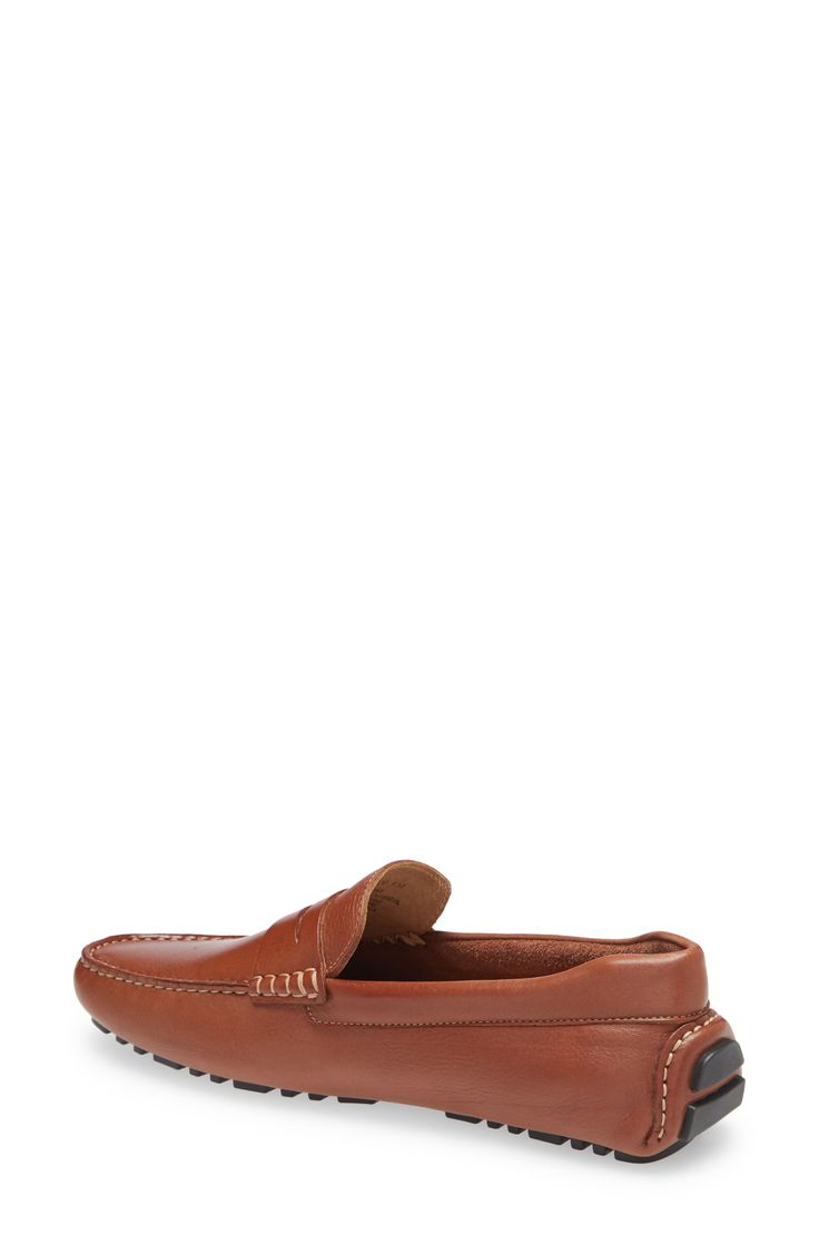 A contoured penny strap and squared moc toe bring classic, timeless detailing to a loafer styled for kicks with a segmented driver sole that wraps up the heel. Leather upper and lining/rubber and leather sole Imported Slip-on Moc Toe Loafers For Driving, Classic Brown Plain Toe Boat Shoes, Classic Slip-on Moc Toe Boat Shoes, Slip-on Moc Toe Driving Loafers, Classic Moc Toe Boat Shoes With Stitched Sole, Classic Leather Moc Toe Boat Shoes, Moc Toe Driving Loafers With Leather Sole, Classic Driving Loafers With Leather Footbed, Classic Moc Toe Driving Loafers