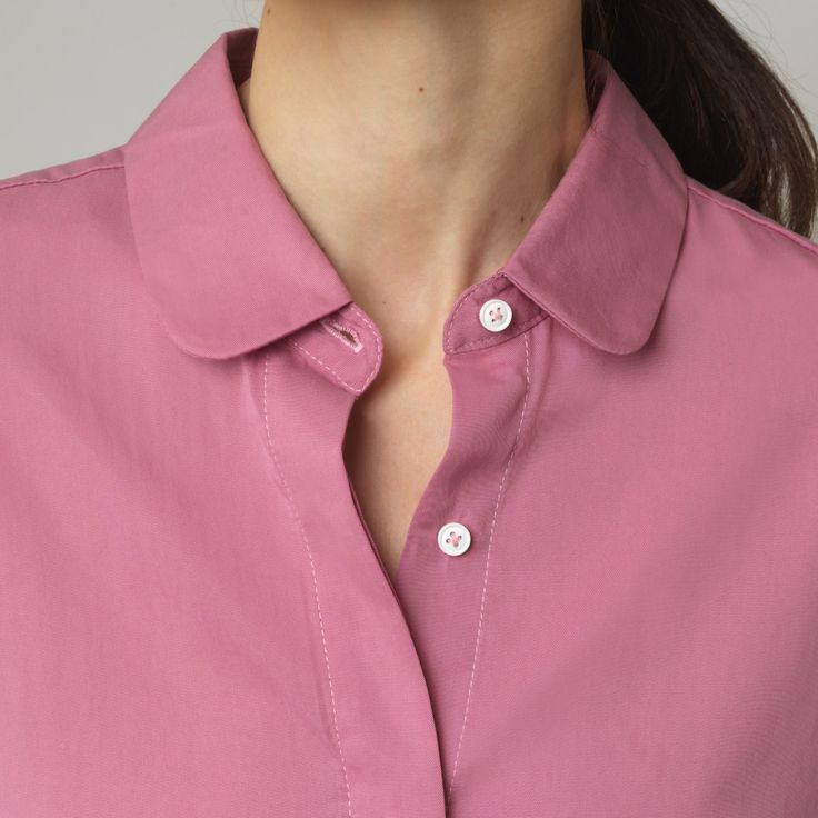 A relaxed fit that works on its own but still fits comfortably under a jacket. Made from drapey tencel fabric with a slight drop shoulder but tailored details like a covered placket, button cuffs and a curved shirt tail keep this button up shirt feeling modern and sophisticated. The rounded collar offers a feminine finishing touch. Wear tucked or untucked. 100% Tencel Oversized Shirt With Concealed Placket, Daywear Blouse With Rolled Sleeves, Unstructured Tops For Spring Workwear, Relaxed Fit Blouse With Fold Down Collar For Daywear, Relaxed Fit Blouse With Button Closure For Layering, Relaxed Fit Blouse With Roll-up Sleeves For Business Casual, Blouse With Rolled Sleeves For Daywear, Relaxed Fit Office Top With Placket, Spring Everyday Spread Collar Blouse