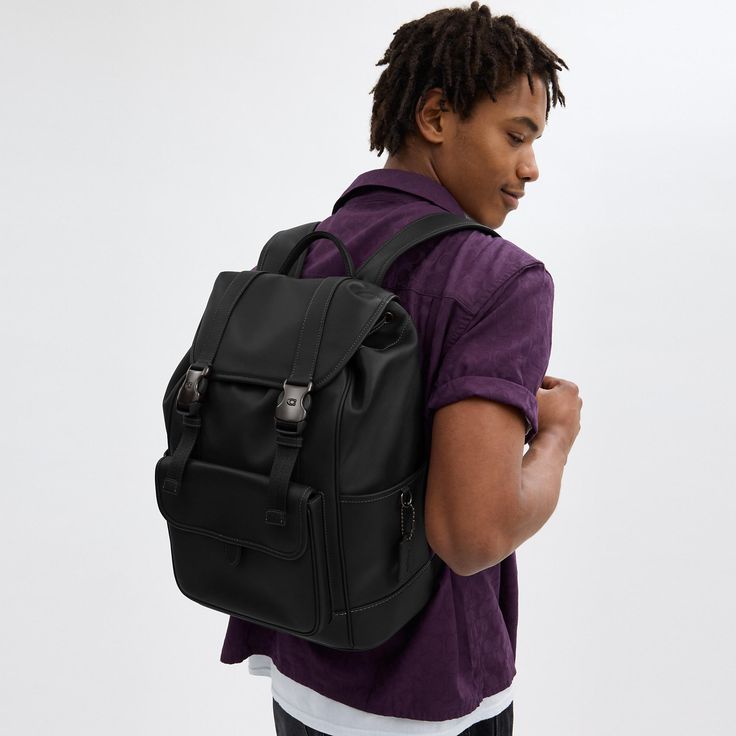 Made for a life in constant motion the League keeps your game plan on track. Crafted of smooth leather this roomy backpack is a comfortable choice for every day with its padded back and straps. Organized with multiple pockets inside and out the sporty style has a dedicated laptop sleeve and plenty of space for notebooks water bottles and other essentials. An exterior zipper gives easy access to the main compartment. | Coach League Flap Backpack - Black Sporty Outdoor Backpack With Multiple Pockets, Functional Leather Backpack For Outdoor Activities, Sporty Nylon Backpack With Multiple Pockets, Urban Travel Backpack With Adjustable Straps, Leather Outdoor Backpack With Functional Pockets, Sporty Leather Backpack, Sporty Standard Backpack With Multiple Pockets, Sporty Backpack With Multiple Pockets, Sporty School Backpack With Multiple Pockets