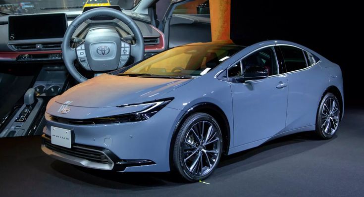 an electric car is on display in a showroom