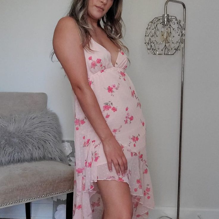 This Beautiful Dress Features A Very Delicate Swiss Dot And Floral Fabric. It's Also Has An Asymmetrical High-Low Hem Line Which Looks So Pretty When You Walk It Features A V-Neckline And It Has Elastic Right Under The Bust To Accentuate That Part It Also Has Lining That Comes Just Mid Thigh Flirty Flowy Midi Dress For Spring, Spring High Low Midi Dress, Spring Midi Length High Low Dress, Flirty Sleeveless Midi Dress For Daywear, Flowy High-low Hem Dress For Spring, Spring Brunch High-low Hem Maxi Dress, Flirty Asymmetrical Hem Beach Dress, Spring Midi Dress With High-low Hem For Brunch, Spring High-low Hem Midi Dress For Brunch