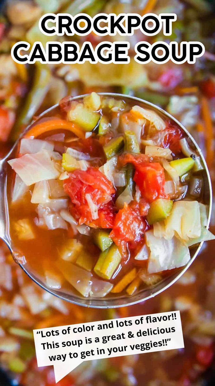 crockpot cabbage soup in a glass bowl with a spoon full of vegetables on the side