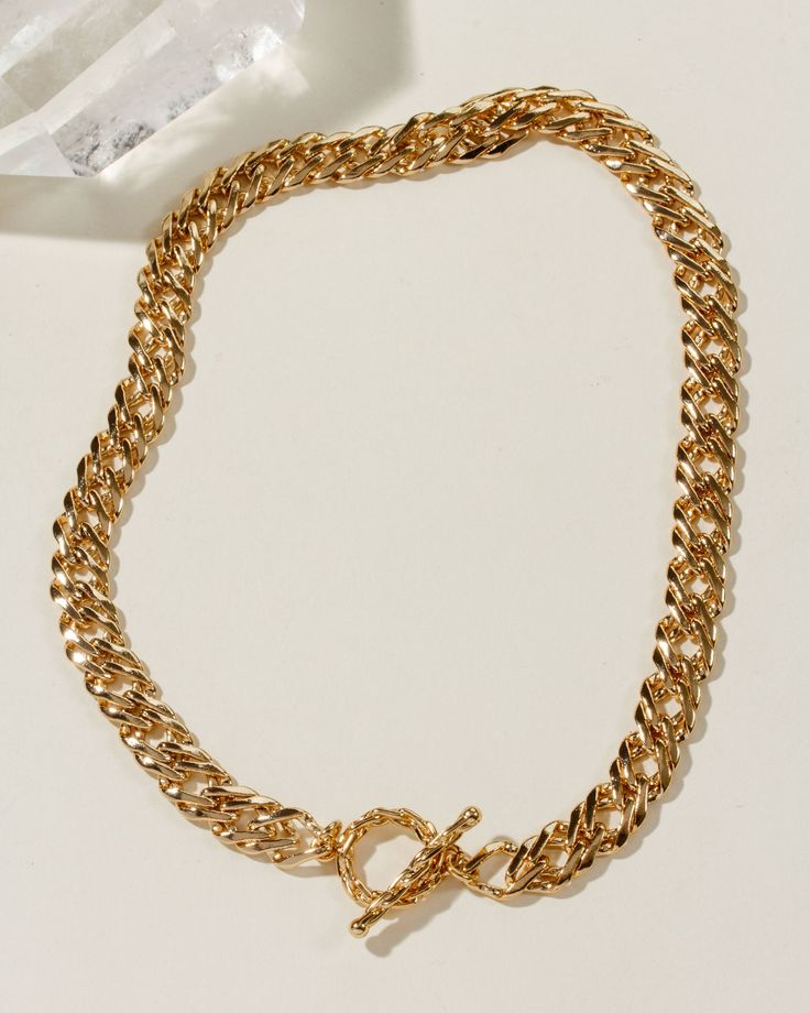 All the trend setters want to know--where did you find your shining star? Crafted to perfection, this luxurious golden piece is sure to flatter all skin tones. This toggle chain can easily transition from one style to next. With its simple toggle closure located in front or back, this versatile necklace will make every outing unforgettable. Gold-tone Toggle Chain Link Necklace With Lobster Clasp, Trendy Link Toggle Necklace With Adjustable Chain, Trendy Toggle Link Necklace With Adjustable Chain, Gold Plated Toggle Necklace With Adjustable Chain, Metal Toggle Necklace With Chain Link Design, Gold Chic Toggle Link Necklace, Gold Link Toggle Necklace Chic Style, Chic Gold Toggle Link Necklace, Chic Gold Link Toggle Necklace