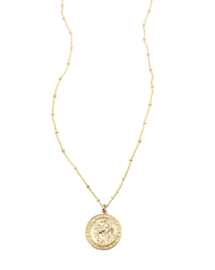 14k gold filled St. Christopher medal, on 14k gold filled chain St. Christopher: One of the 14 Auxiliary Saints, Saint Christopher is the patron saint of all travelers. The name Christopher means Christ bearer in Greek, or one who carries Christ. One of the most famous and treasured stories about St. Christopher is the story of the child he found and then carried across a mighty river. The child in the story is later revealed to be Christ which is why this figure is the patron saint of travelers Gold Coin Pendant Necklace Stamped 14k, Gold Pendant Coin Necklace Stamped 14k, Gold Coin Necklace With Stamped 14k Round Pendant, Gold Coin Necklace With 14k Stamp, Spiritual 14k Gold Coin Pendant Necklace, 14k Yellow Gold Filled Medallion Necklaces, 14k Gold Filled Yellow Gold Medallion Necklace, Spiritual 14k Gold Charm Necklaces With Coin Pendant, Dainty Gold Engraved Coin Necklace